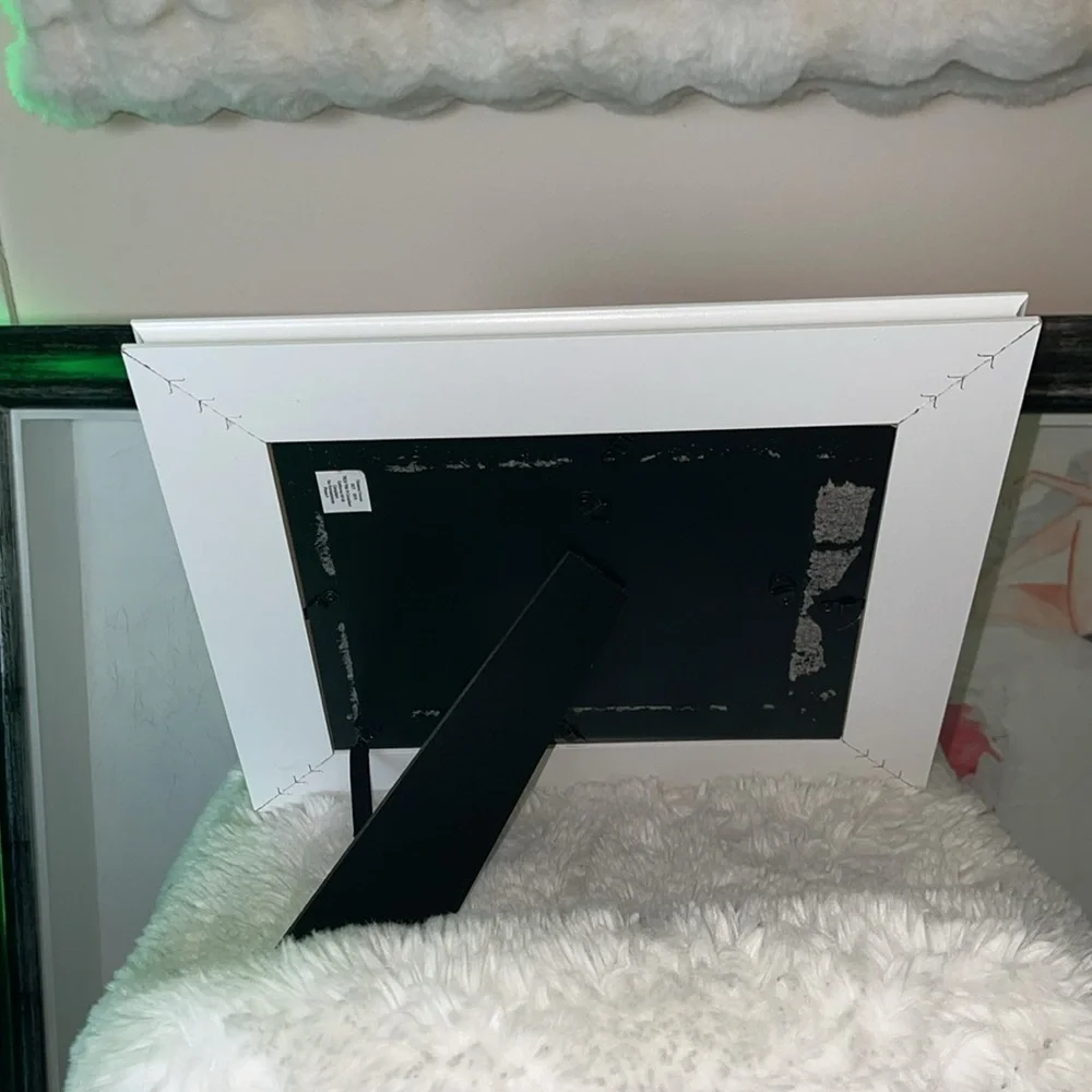 White frame not new had some paint section that was removed can be repaired